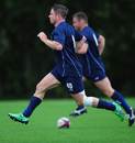 Wales' Shane Williams stretches out in training