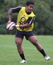 England's Manu Tuilagi looks for support