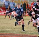 The Griquas' Barry Geel looks to shift the ball