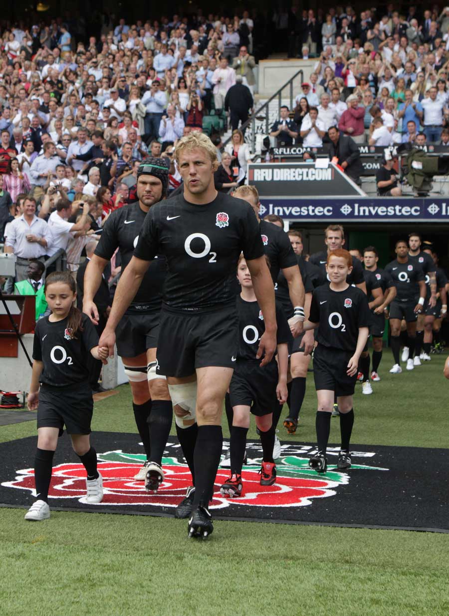 England's Lewis Moody leads his troops out