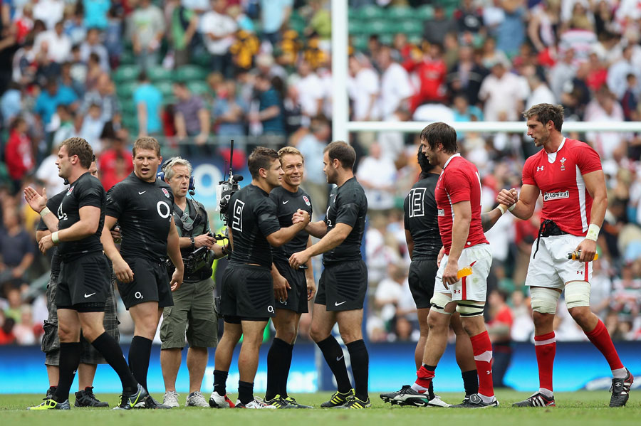 England and Wales' players shake hands at full-time