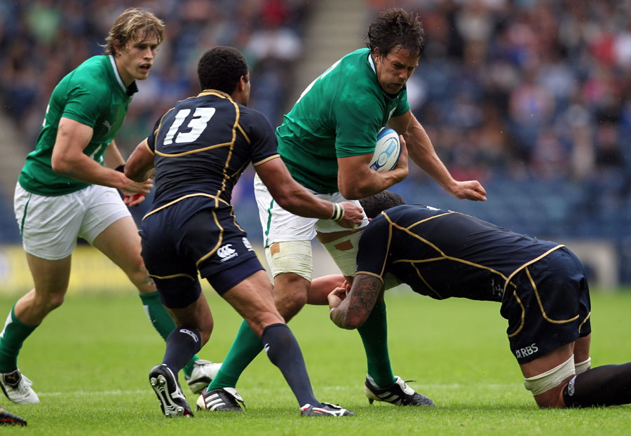 Ireland flanker Mike McCarthy takes on the Scotland defence