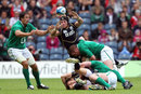 Scotland's Ross Rennis tries to claim a loose ball