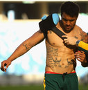 Digby Ioane is helped off the field in training