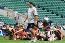 England's Martin Johnson surveys the scene during open training