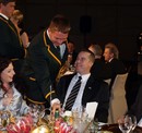 South Africa's captain John Smit serves his guests