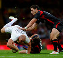 England centre Mike Tindall is upended