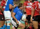 Italy's Andrea Lo Cicero is congratulated on a try