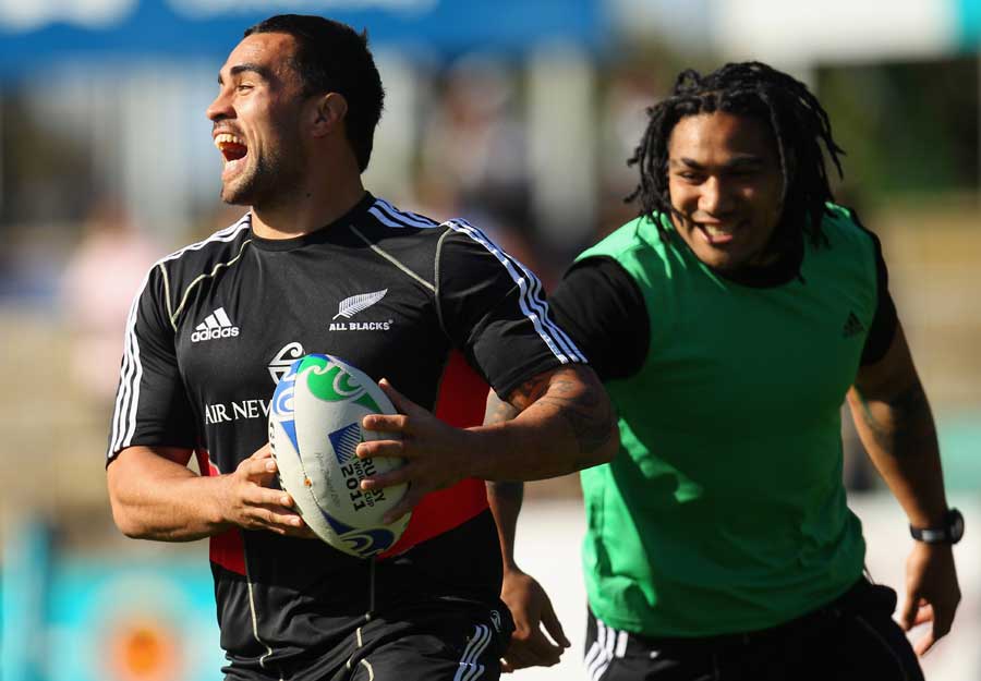 All Blacks No.8 Liam Messam is tagged by Ma'a Nonu