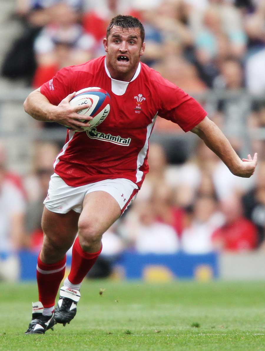 Hooker Huw Bennett on the charge for Wales