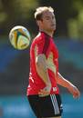 All Blacks scrum-half Andy Ellis flicks the ball out during training