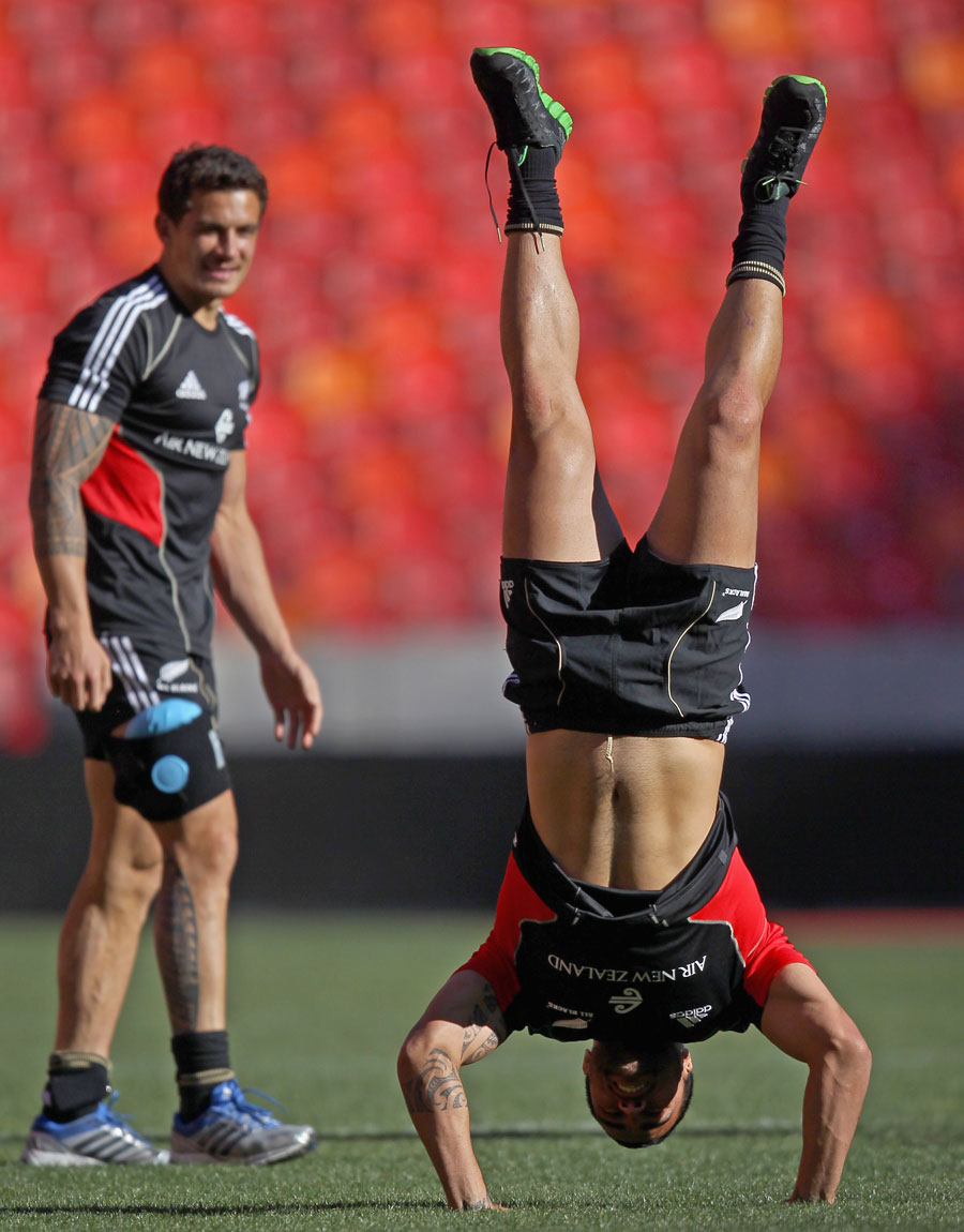 New Zealand's Liam Messam shows off his hand-stand
