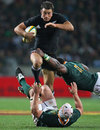 New Zealand's Richard Kahui attempts to hurdle the South Africa defence