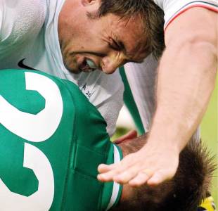 Ireland's Luke Fitzgerald cops an earful from France's Vincent Clerc
