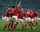 Wales players celebrate the final whistle in Paris
