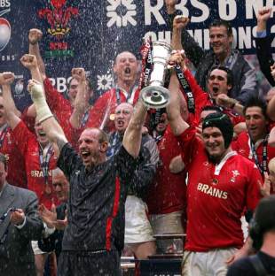 Wales co-captains Gareth Thomas and Michael Owen lift the Six Nations trophy, Wales v ireland, Six Nations, Millennium Stadium, March 19 2005.