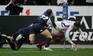 France winger Cedric Heymans manages to stay infield long enough to ground the ball during France's 46-19 win over Scotland, France v Scotland, Six Nations, Stade de France, March 17 2007.