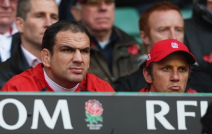 Martin Johnson, The England team manager and Brian Smith (R), the England attack coach look on prior to kickoff 