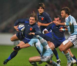Cedric Heymans of France is tackled by Horacio Agulla of Argentina during the Friendly International between France and Argentina at the Stade Velodrome in Marseilles, France on November 8, 2008.