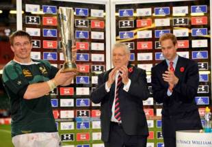 South Africa captain John Smit holds the trophy presented by Prince William (R) after defeating Wales in the International match between Wales and South Africa held at the Millenium Stadium in Cardiff, Wales on November 8, 2008.