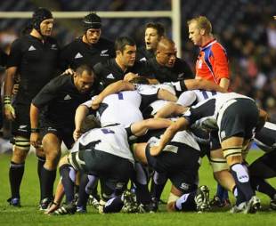 (L to R) John Afoa, Corey Flynn and Neemia Tialata of the All Blacks pack down in the scrum during the match between Scotland and New Zealand at Murrayfield in Edinburgh, Scotland on November 8, 2008. 