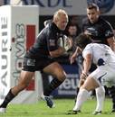 Brive's Shane Geraghty runs at his opposite number in the Agen ranks