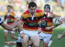 Waikato's Stephen Donald tries to bust through the Auckland defence