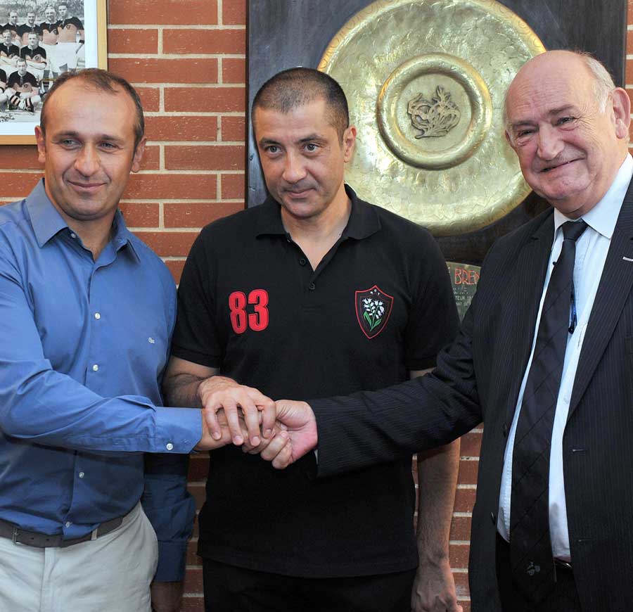 New French boss Phillipe Saint-Andre shakes hands with Toulon supremo Mourad Boudjellal and FFR president Pierre Campou