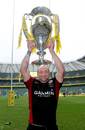 Saracens captain Steve Borthwick holds aloft the Aviva Premiership trophy
