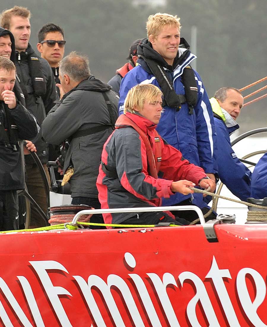 England's Lewis Moody watches on while taking a trip on an ex-America's Cup yacht