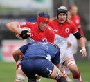 Biarritz lock Jerome Thion tries to dodge a tackle