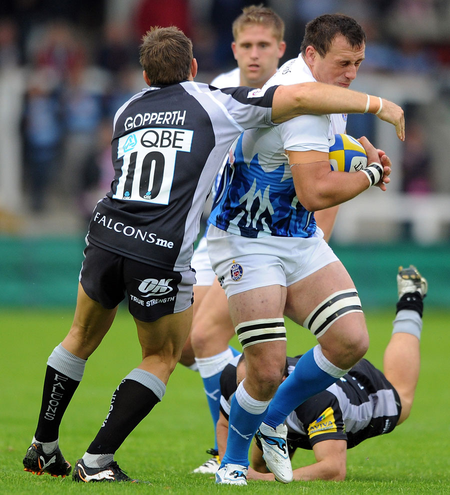 Bath's Carl Fearns is tackled by Jimmy Gopperth