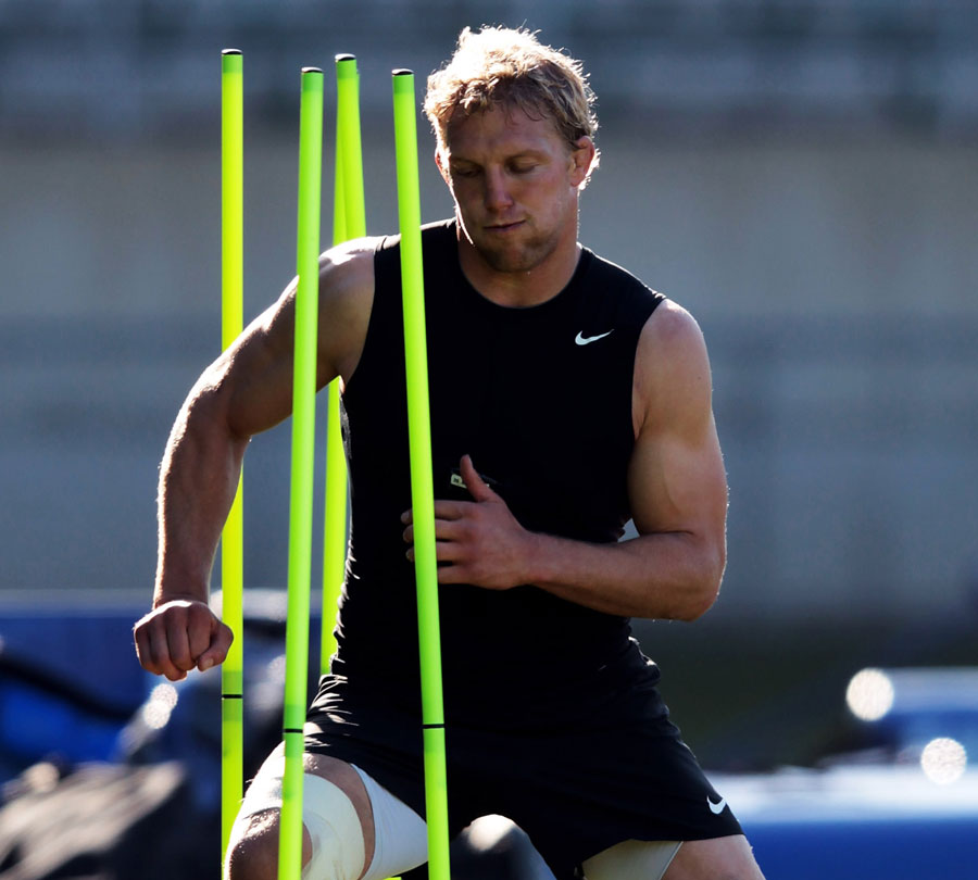 England captain Lewis Moody warms up for his side's World Cup opener