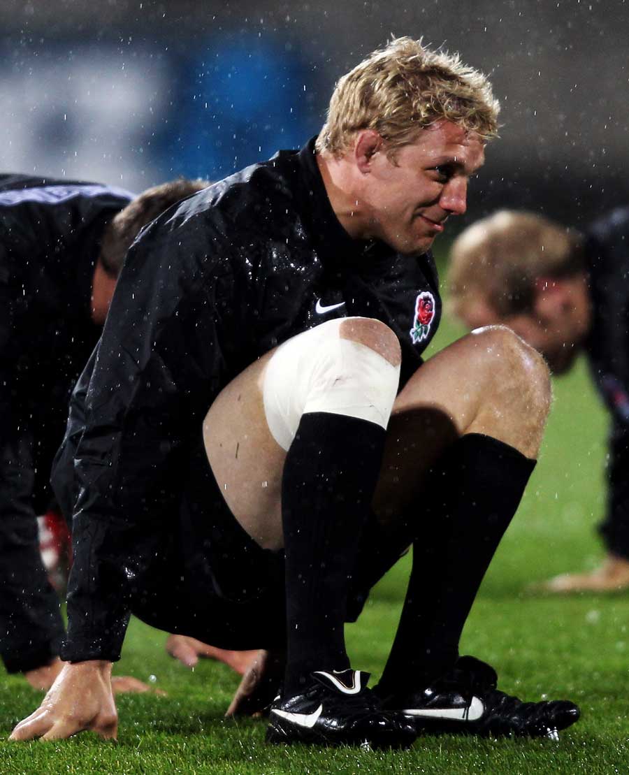 England captain Lewis Moody stretches out the troublesome right knee