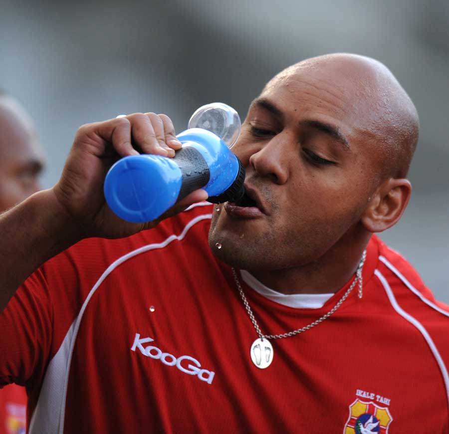 Tonga's Soane Tonga'uiha takes on some liquid during the Captain's Run