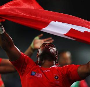 Tonga's Taneila Moa holds aloft the Tongan flag after they impress in the World Cup opener, New Zealand v Tonga, Rugby World Cup, Eden Park, Auckland, New Zealand, September 9, 2011