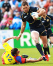 Scotland's Sean Lamont charges through the Romania defence