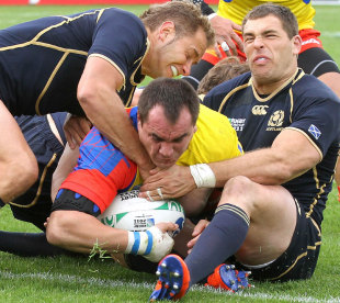 Romania's Daniel Carpo forces his way over against Scotland, Scotland v Romania, Rugby World Cup Pool B, Rugby Park Stadium, Invercargill, New Zealand, September 9, 2011