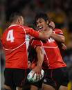 Japan celebrate their try