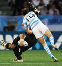 England's Ben Foden is tackled by Argentina's Gonzalo Camacho