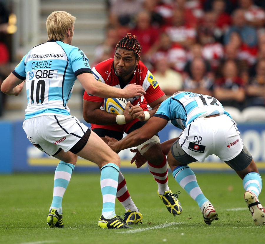 Gloucester wing Lesley Vainikolo runs in to trouble