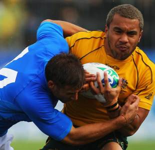 Australia's Digby Ioane finds his way blocked by Italy's Tommaso Benvenuti