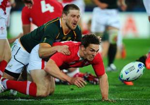 Wales' George North gets the ball away under pressure from Frans Steyn, South Africa v Wales, Rugby World Cup, Wellington Stadium, New Zealand, September 11, 2011