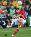 Wales fullback James Hook kicks a penalty