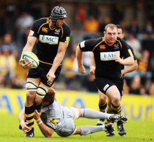 Wasps' Marco Wentzel is tackled by Ed Slater, London Wasps v Leicester Tigers, Aviva Premiership, Adams Park, Wycombe, England, September 11, 2011