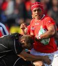 Tonga's Sione Timani feels the force of Jebb Sinclair