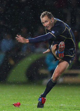 Scotland fly-half Dan Parks kicks for goal in testing conditions, Scotland v Georgia, Rugby World Cup, Rugby Park Stadium, Invercargill, New Zealand, September 14, 2011