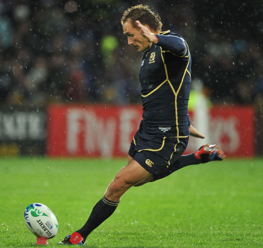 Scotland fly-half Dan Parks kicks for goal in testing conditions