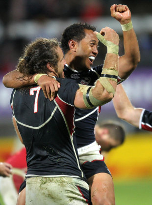 The United States' Todd Clever and Roland Suniula celebrate victory, Russia v USA, Rugby World Cup, Stadium Taranaki, New Plymouth, New Zealand, September 15, 2011
