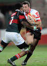 The Lions' Doppies le Grange is tackled by Luvuyiso Lusaseni